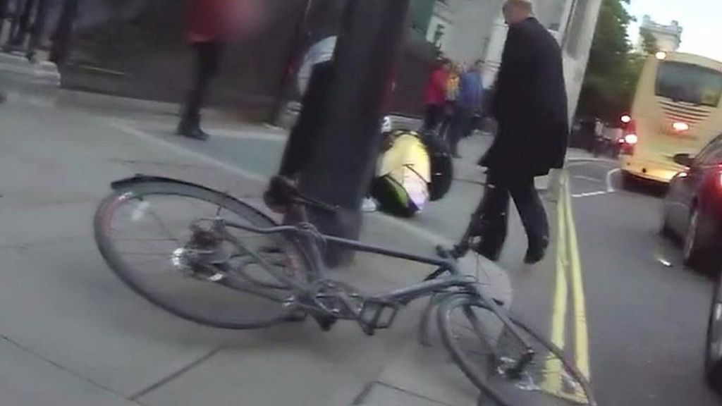 Transport Secretary Chris Grayling knocks cyclist off bike