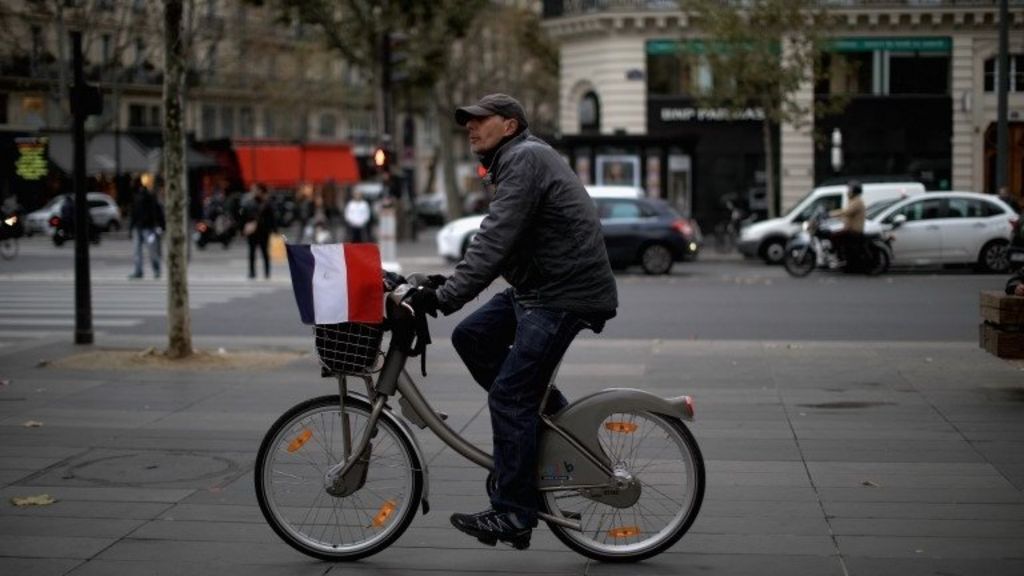 Defiant French businesses carry on