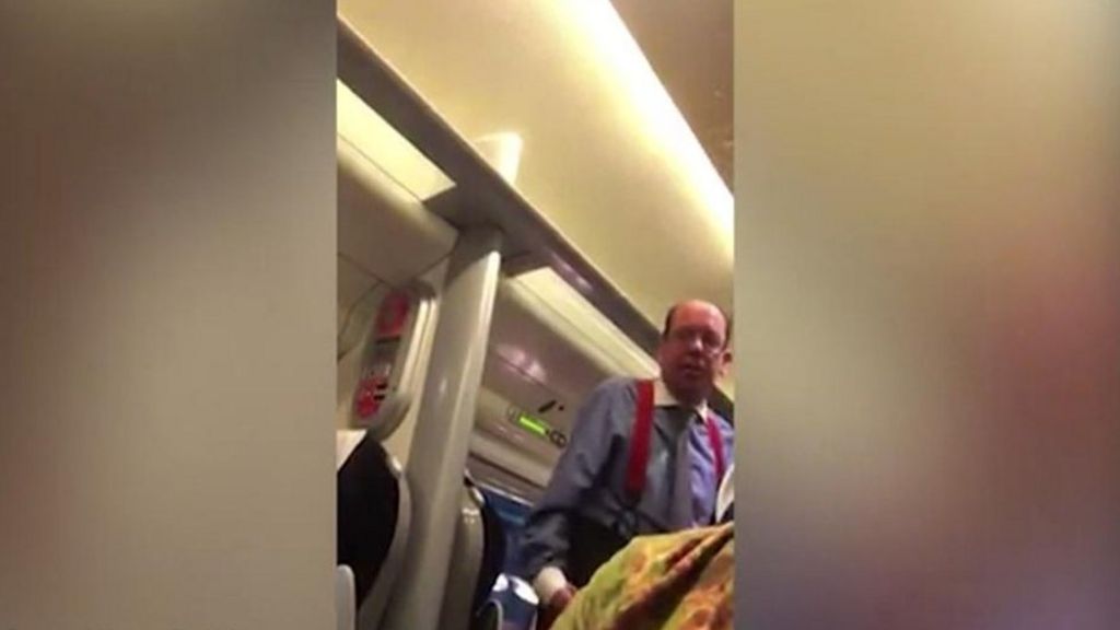 Woman praises train guard after racist attack
