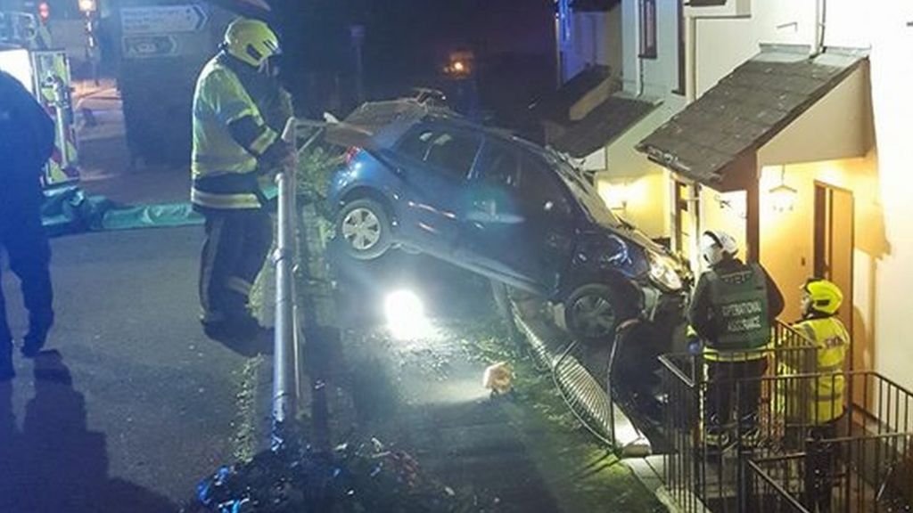 Car plunges off main road into house in South Devon