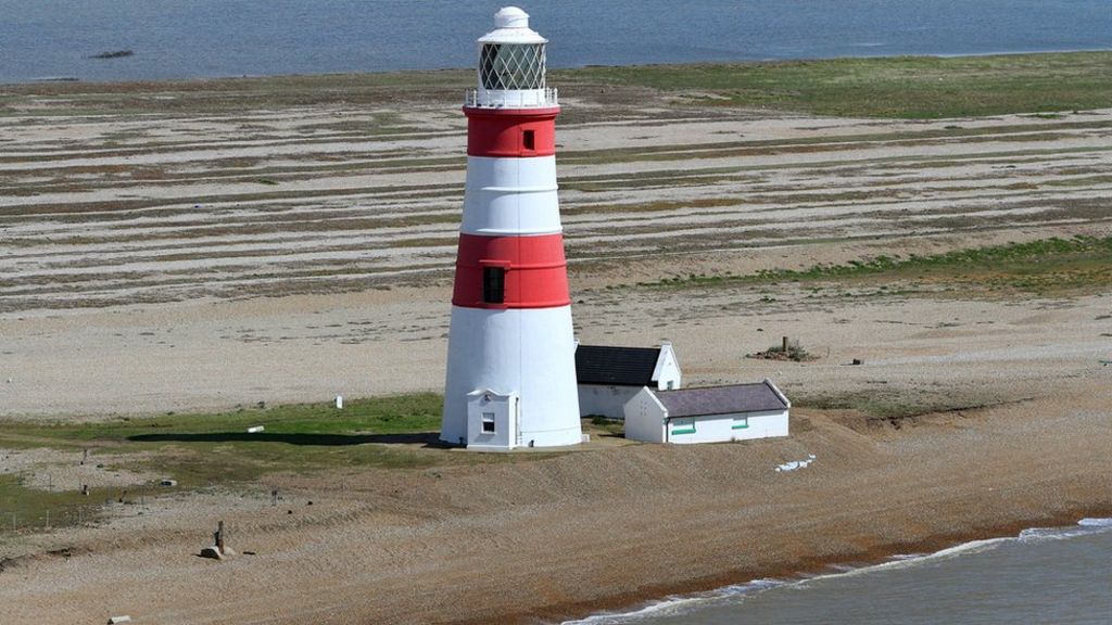 Lighthouse 'perilously close' to sea