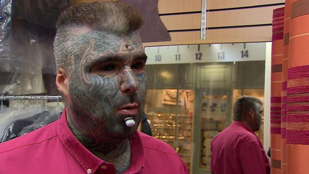 Tattooed man 'moved out of public view in former job'