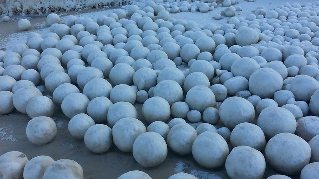 Giant snowballs on Russian beach