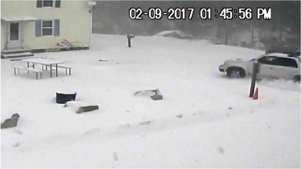Car veers off road in blizzard conditions in the US