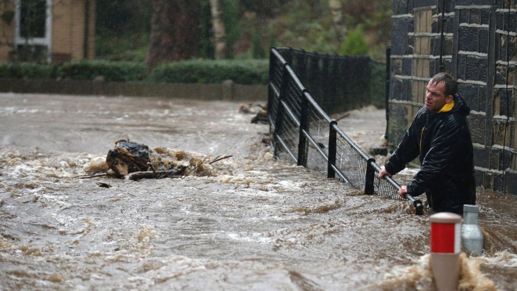 Floods hit parts of UK amid downpours