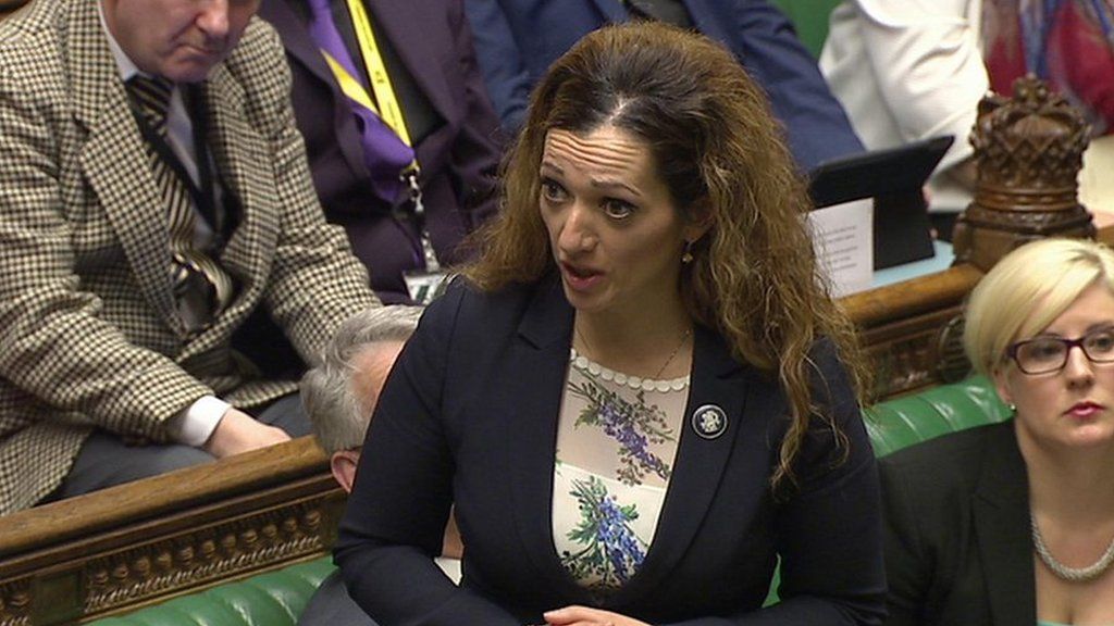 Tory MP Soames sorry for 'woofing' at Tasmina Ahmed-Sheikh