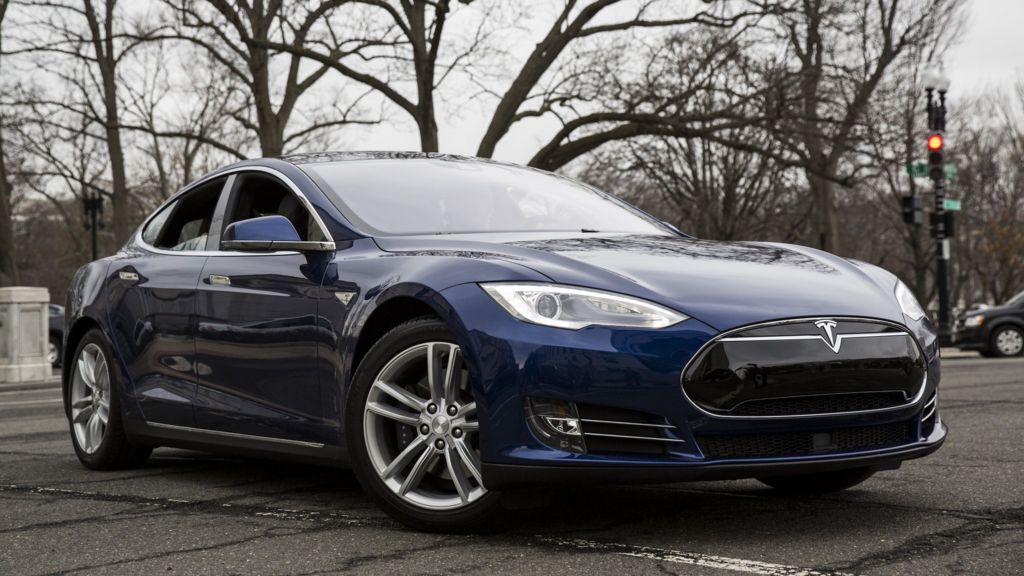 Authorities investigate after Tesla car catches fire