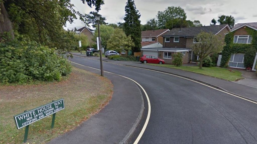 Teen held after men hit by car in Solihull - BBC News