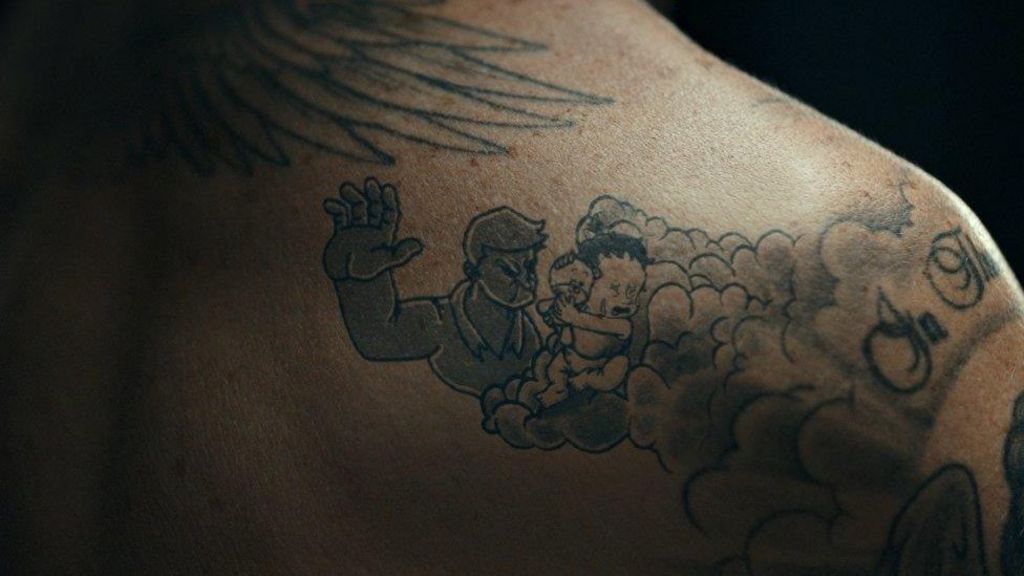 David Beckham tattoos come to life for child abuse campaign - BBC News