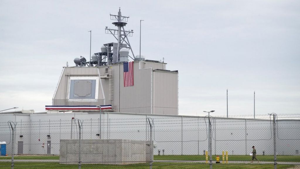 Putin warns of threats as US base opens