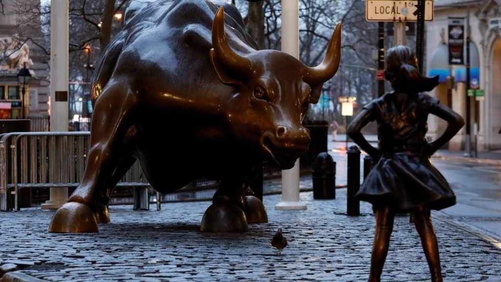 Girl statue faces Wall Street bull to fight gender inequality