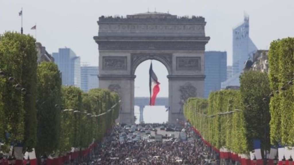 Crowds flock to car-free Champs Elysees