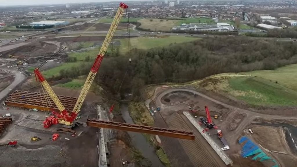 New M8 bridge lifted into place