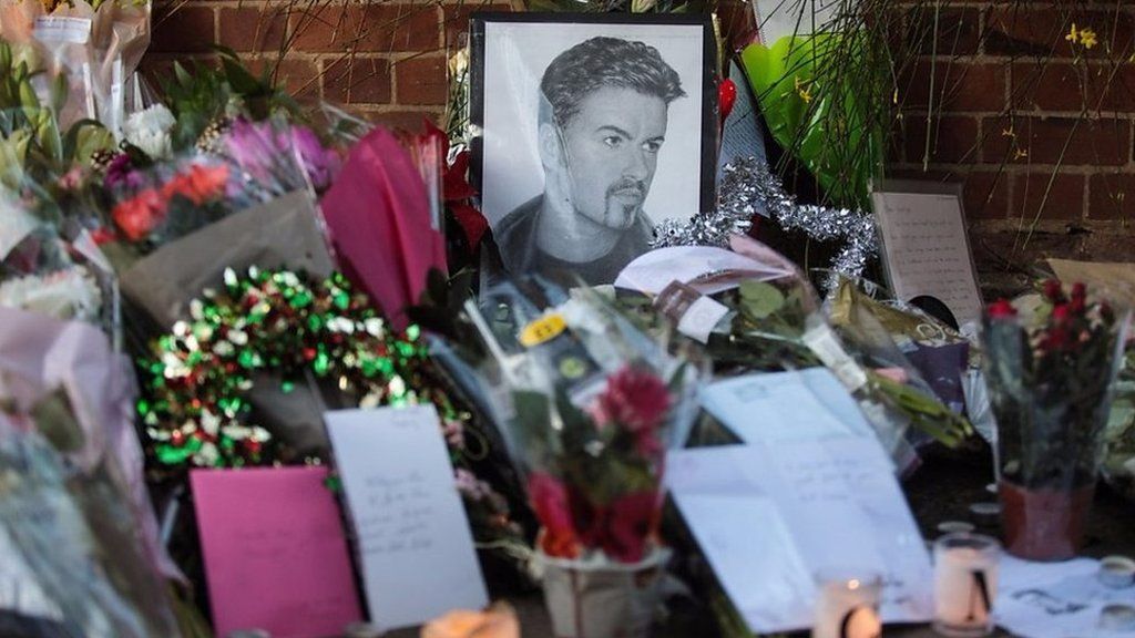 Tributes build at George Michael's home