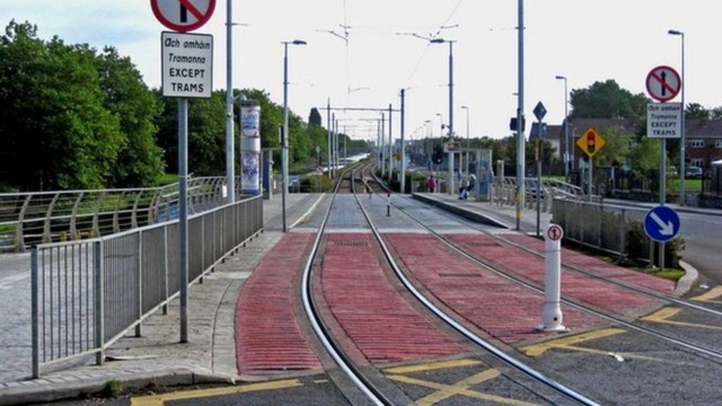 12 injured as car and tram crash