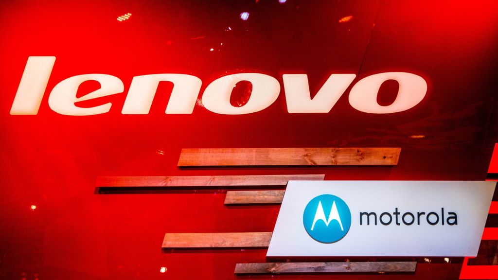 Lenovo cuts jobs as profits halve