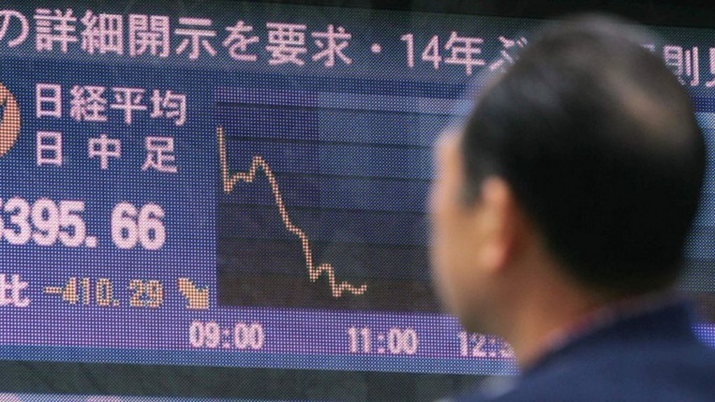 Japanese shares hit one-year low
