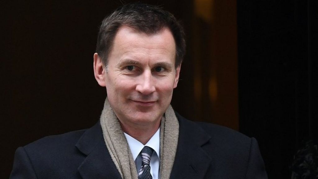Jeremy Hunt gun threat tweet NHS worker suspended