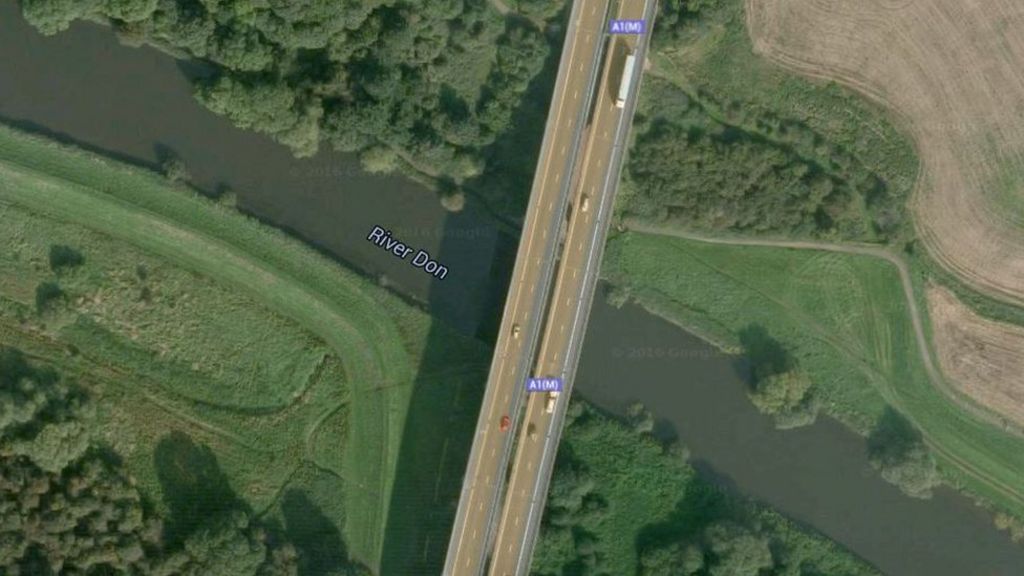 Driver killed in motorway river plunge