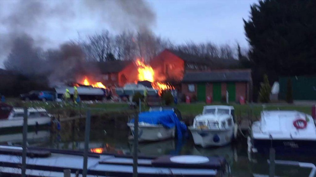 Fire rages after explosion in city