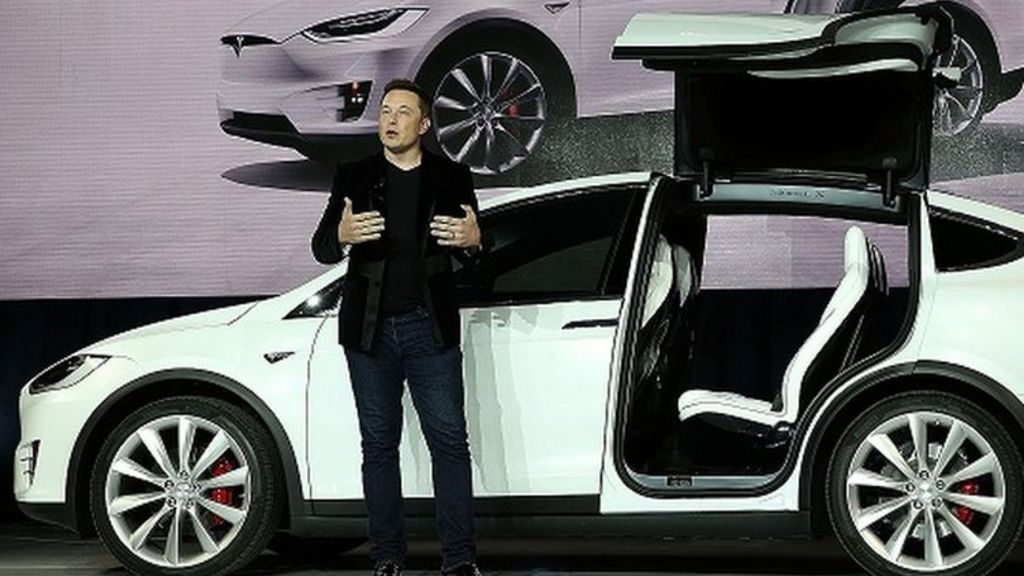 Tesla reports deepening losses