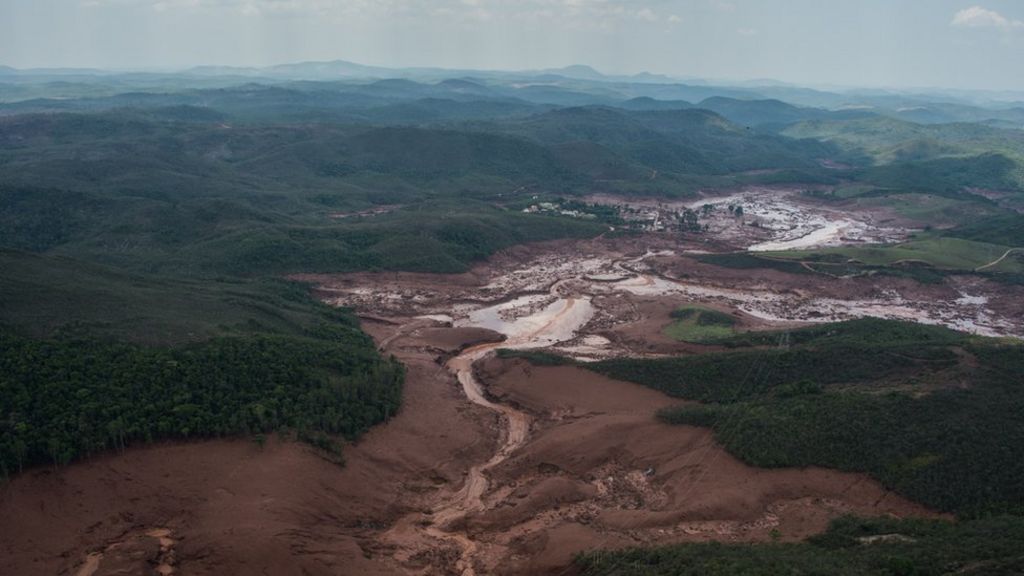 Mining companies fined over dam burst