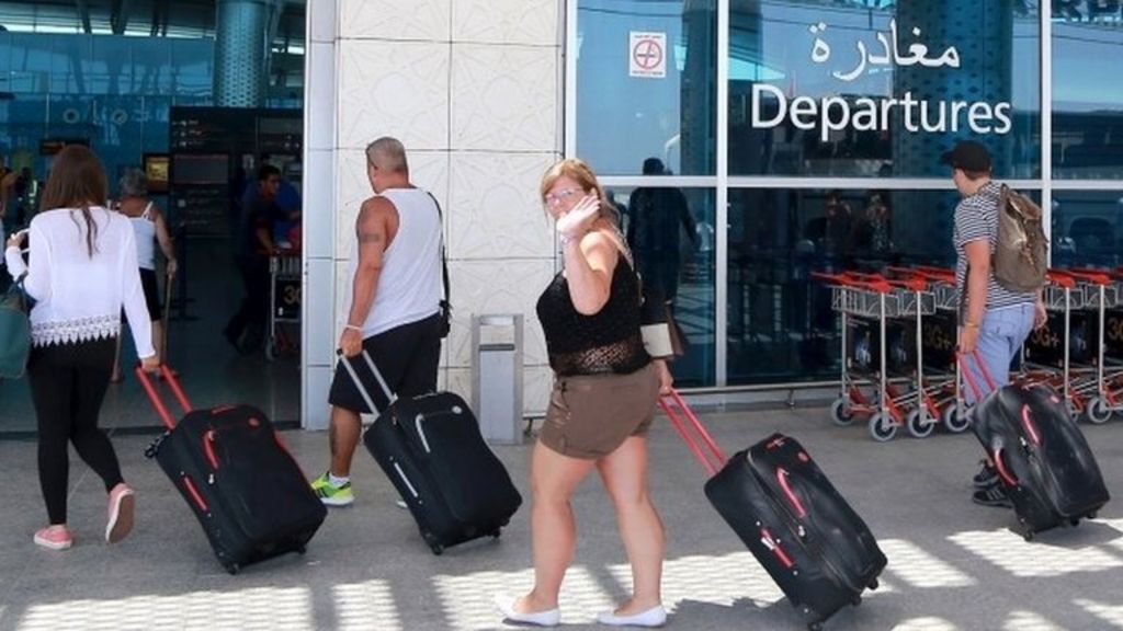 Tunisia Britons fly home after alert