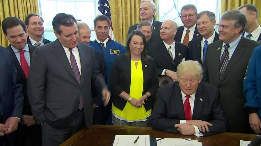 President jokes while signing space agency funding bill