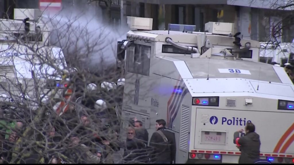 Brussels police clash with protesters