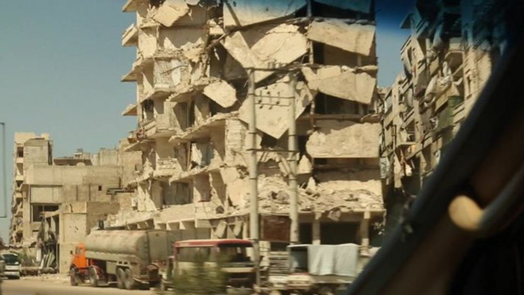 Syria ceasefire: Devastation on road into west Aleppo