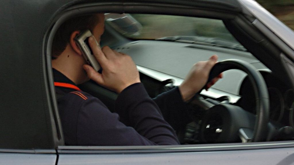 Thousands caught driving distracted twice over four years