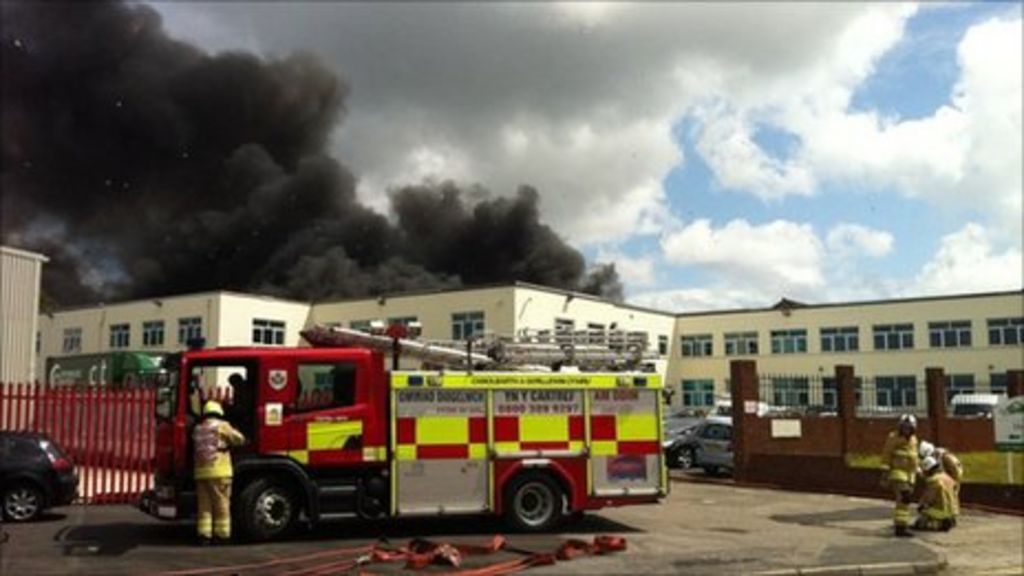 Swansea factory fire 'still going strong' BBC News
