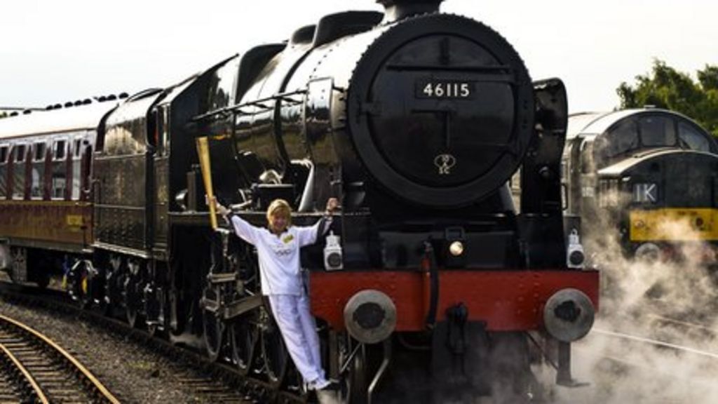 Olympic torch Flame boards steam train for York to Carlisle leg BBC News