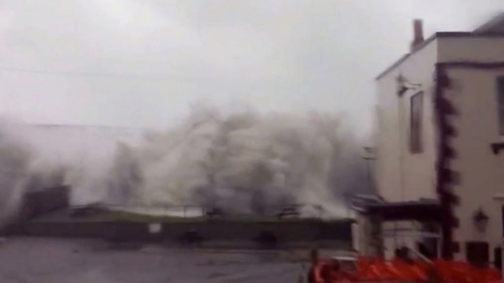 Storm waves crash over Chesil Beach, Dorset BBC News
