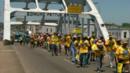 People taking part in NAACP march to from Selma to Washington in support of Voting Rights Act which they say is under threat