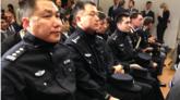 Chinese Police officers, seated at a news conference alongside Italian police and journalists, at the Italian Interior Ministry headquarters in Rome, 2 May 2016