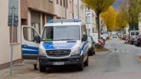 Police secure a street in Hamelin, Germany, on 21 Nov 2016 after a woman is found seriously injured