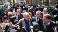 Ken Livingstone surrounded by cameras in Wesminster