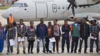 The group of young Eritreans ready to board a plane that will take them to Sweden