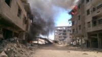 The aftermath of an airstrike in Daraya