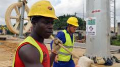 Chinese and Ivorian construction workers