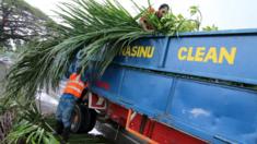 Men cleaning up the streets