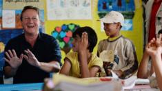 David Cameron meets Syrian refugee children at a camp in Jordan