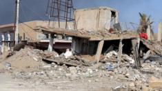 A destroyed building is seen near a government complex in the city of Ramadi (28 December 2015)