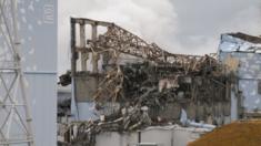 In this 15 March 2011 photo taken by Tokyo Electric Power Co. (TEPCO), steam billows from Unit 3 reactor building after an explosion at the Fukushima Dai-ichi nuclear power plant