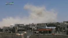 Video posted online by opposition activists purportedly showing smoke rising from Rastan, Syria, after government air strike on 18 May 2016