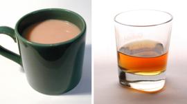 A cup of tea and a glass of whisky