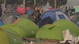 The BBC's Gavin Lee at migrant camp