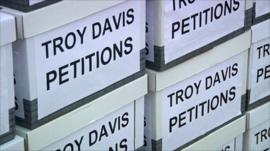 Boxes containing petitions for Troy Davis