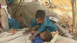 Children in camps after floods